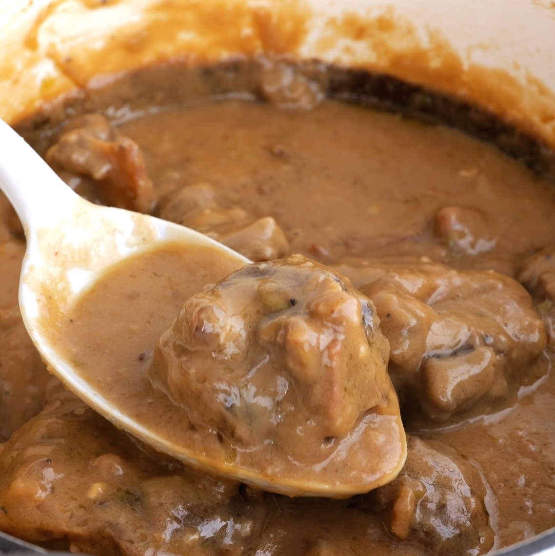 A close up picture of Southern oxtails smothered in gravy.